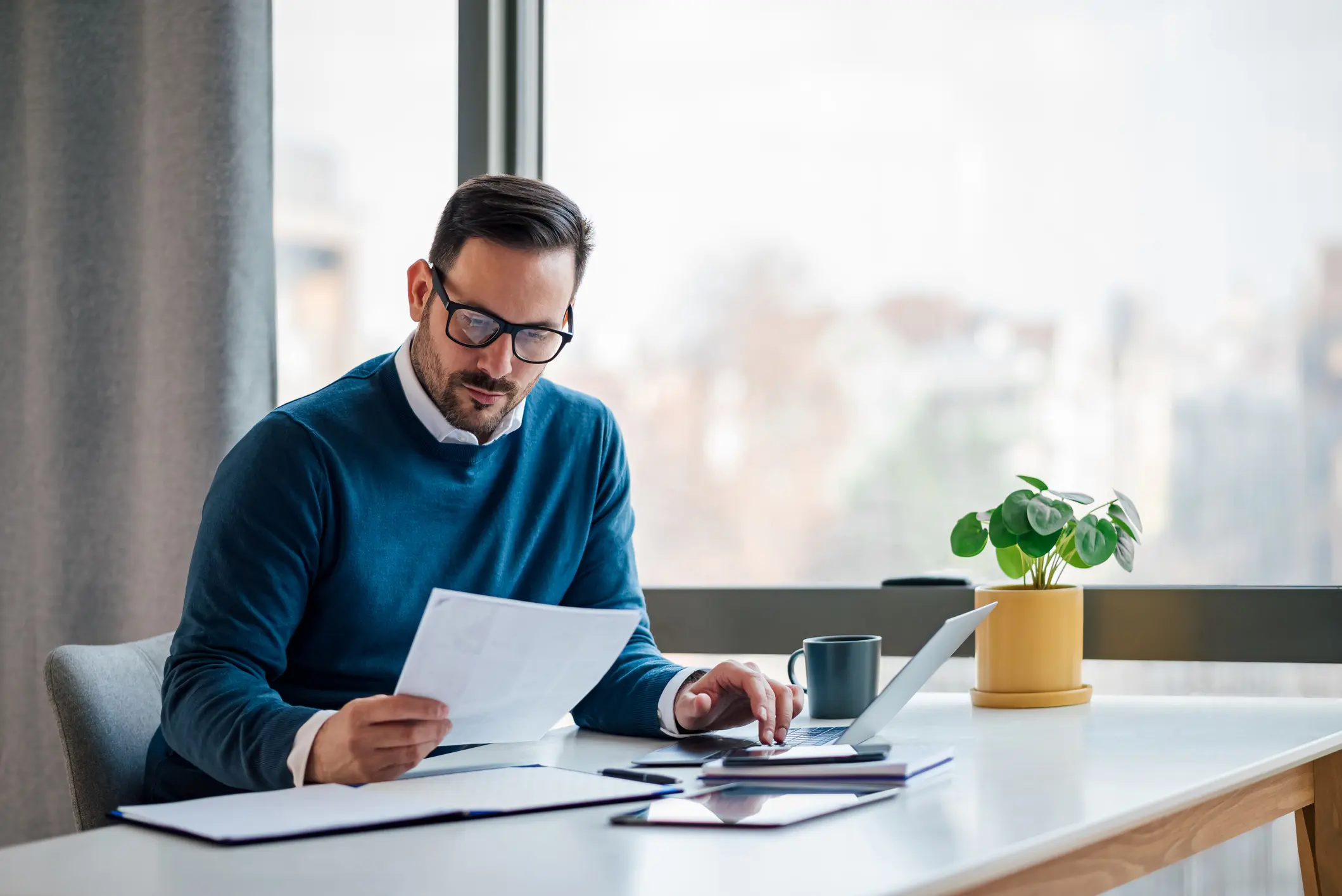 IRS-enrolled agent working on tax prep services for individuals and businesses.